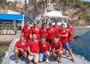 I ricercatori dei tre Paesi ed il personale dell’Astrea sul molo del porto di Fontvieille, a Montecarlo